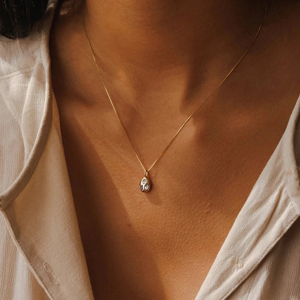 EManco Stainless Steel Teardrop Pendant Necklace with Mixed Purple and Clear Cubic Zirconia Minimalist Style for Daily Commute