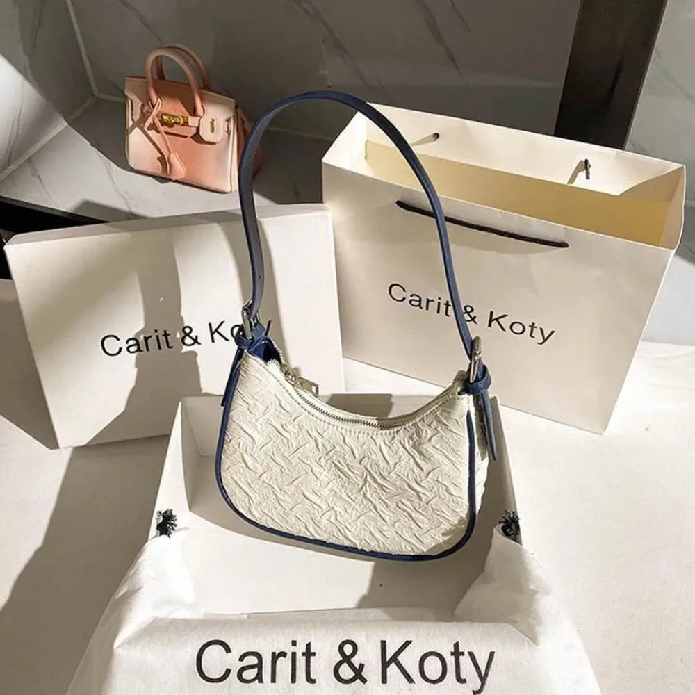 Original design advanced sense this year's popular pleated bag female summer niche design crescent bag underarm bag shoulder
